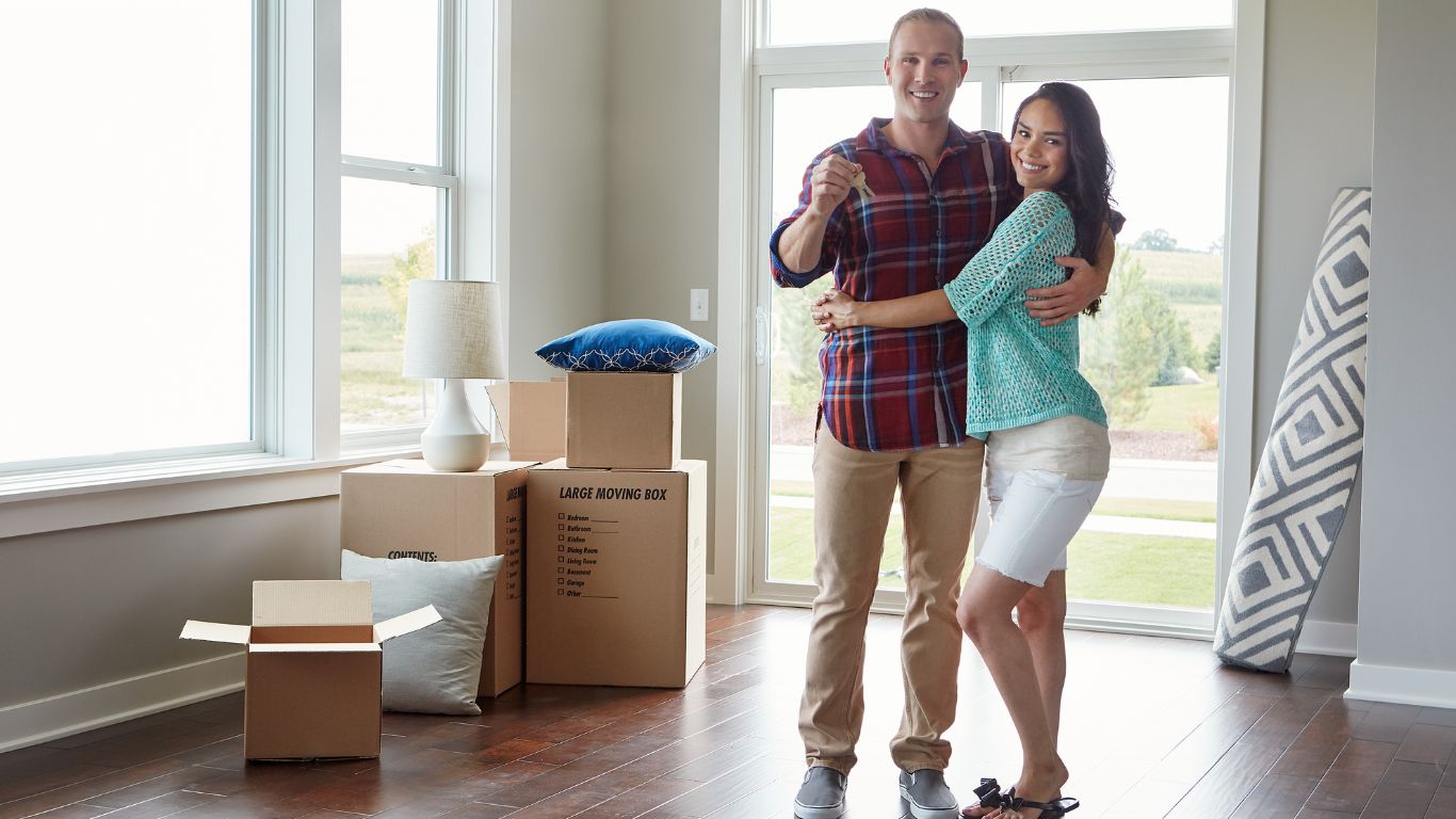 young couple moving into new home