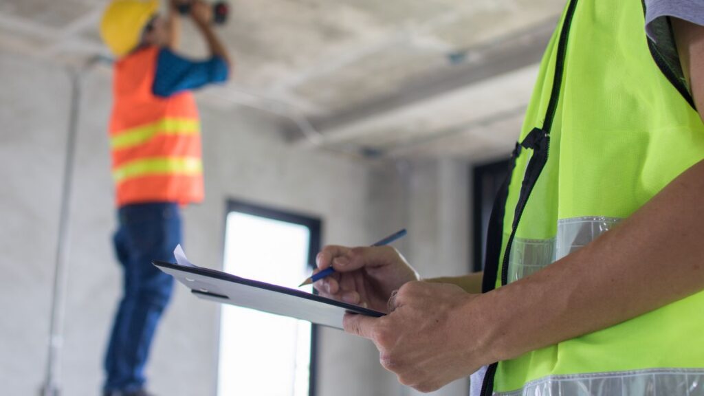 Mold inspection cost Los Angeles homeowner reviewing an inspection report